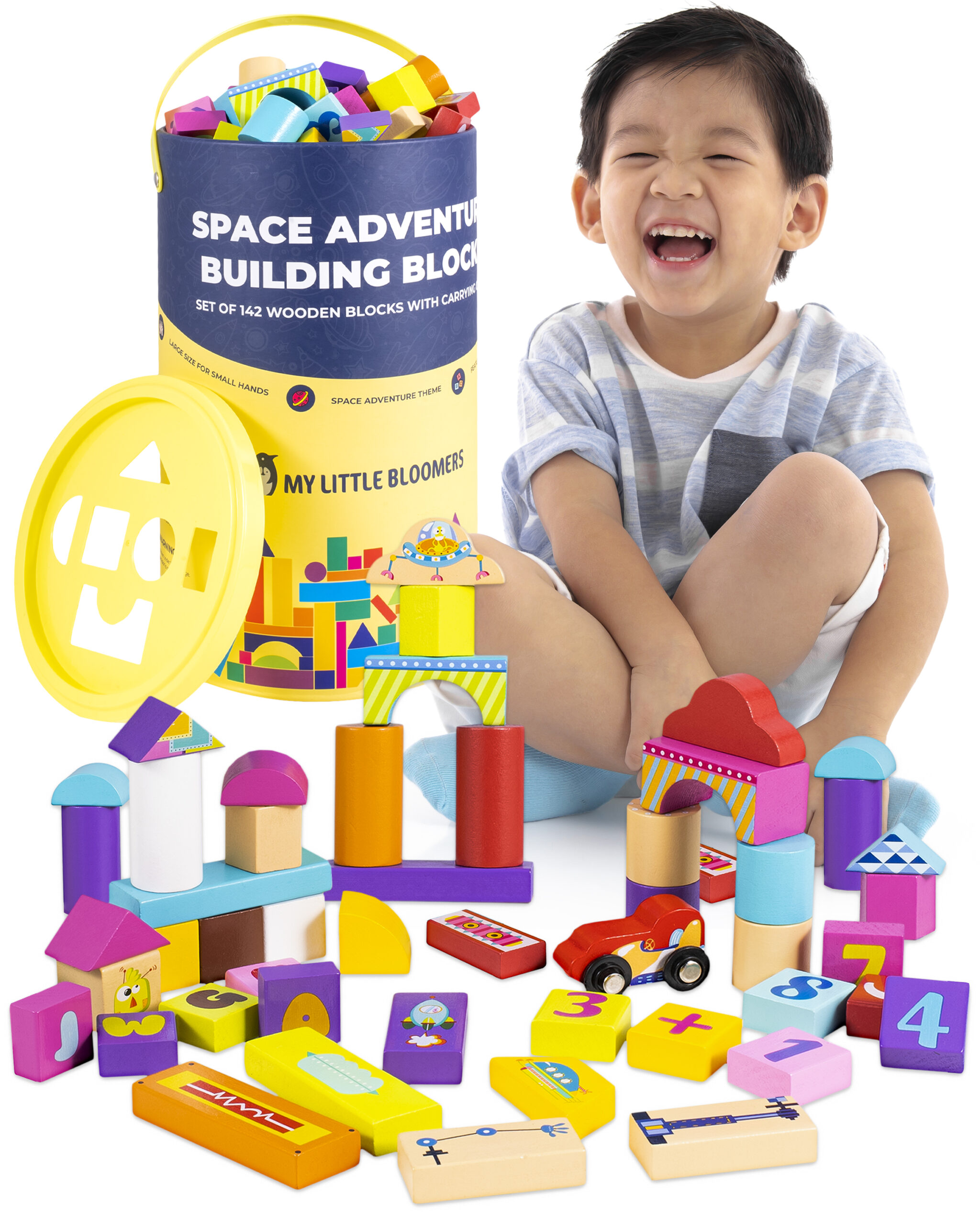 happy boy with space building blocks